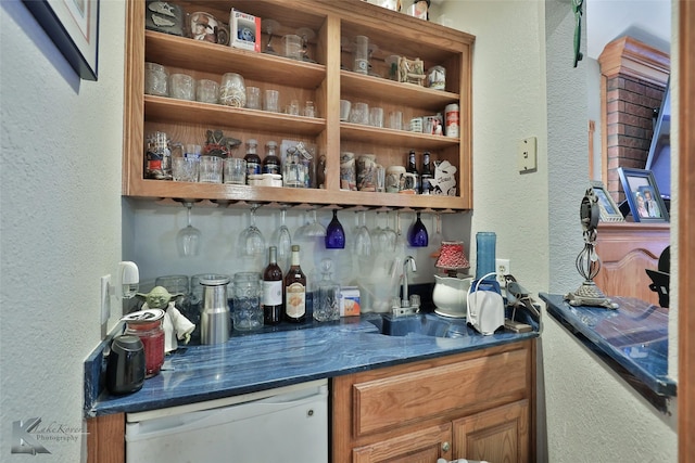 bar with sink and white dishwasher