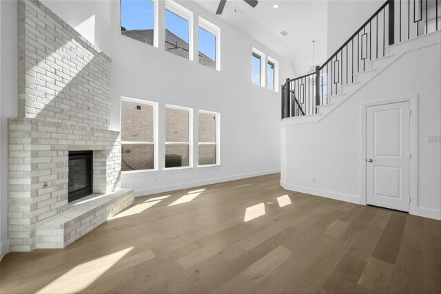 kitchen with white cabinets, hanging light fixtures, appliances with stainless steel finishes, and sink