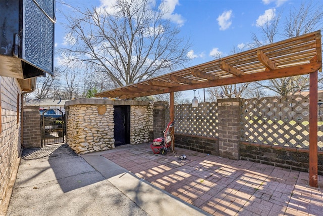 view of patio featuring a pergola