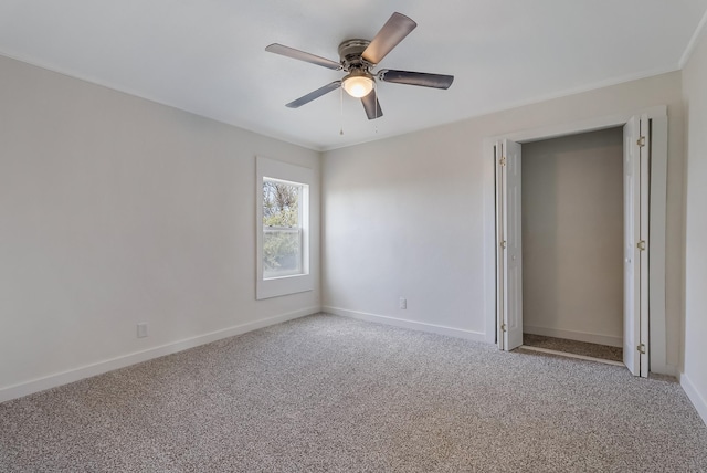 unfurnished bedroom featuring carpet flooring and ceiling fan