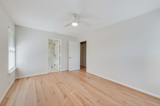 spare room with ceiling fan and light hardwood / wood-style flooring