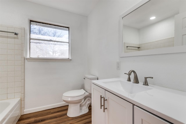 full bathroom with vanity, shower / bathtub combination, toilet, and wood-type flooring