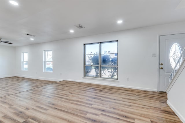 entryway featuring light hardwood / wood-style flooring and ceiling fan