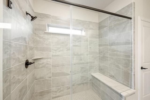 bathroom featuring a stall shower