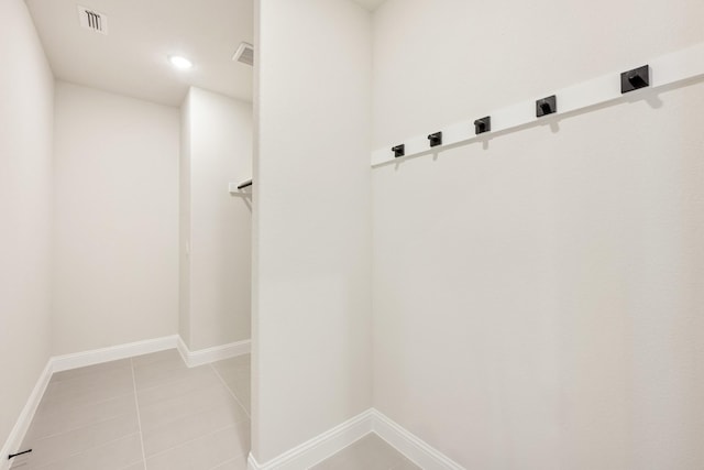 mudroom featuring light tile patterned floors, recessed lighting, visible vents, and baseboards