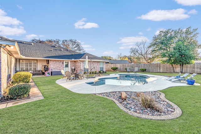 view of pool with a yard, a fenced in pool, a fenced backyard, and a patio