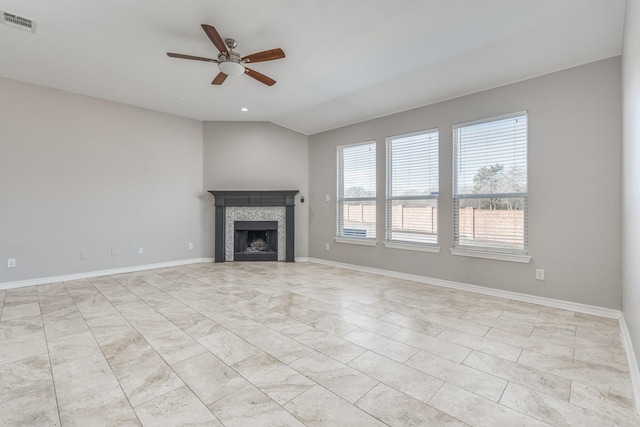 unfurnished living room with ceiling fan and lofted ceiling