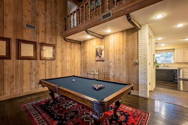 playroom with pool table, dark hardwood / wood-style flooring, and wood walls