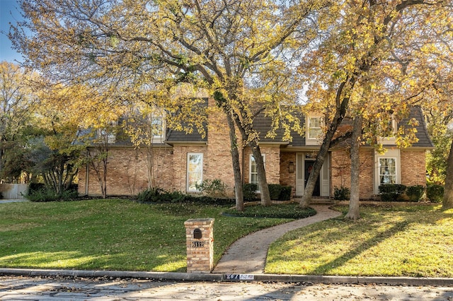 view of front of home with a front yard