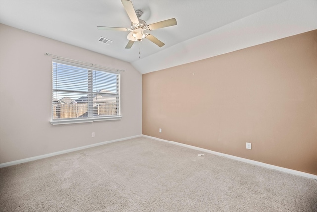 unfurnished room featuring carpet, ceiling fan, and lofted ceiling