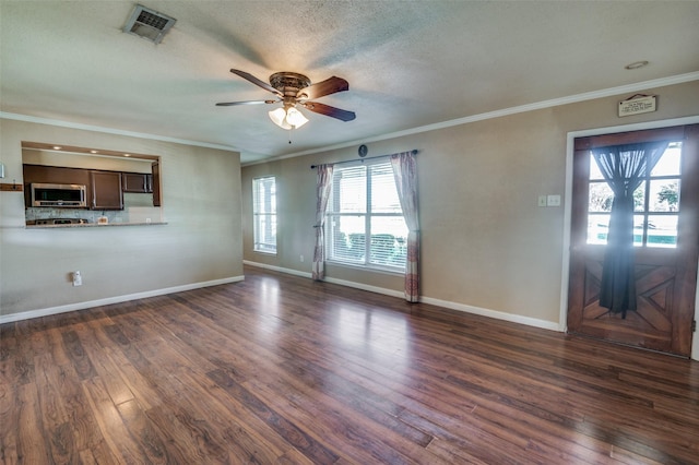 interior space featuring a textured ceiling, ceiling fan, dark hardwood / wood-style floors, and ornamental molding