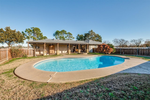 view of swimming pool with a patio