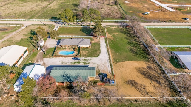 birds eye view of property featuring a rural view