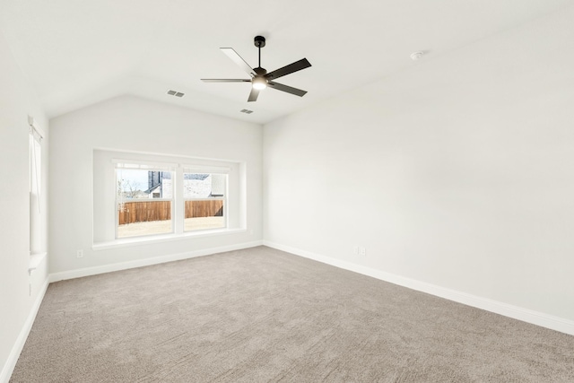 unfurnished room with a ceiling fan, carpet flooring, visible vents, and baseboards