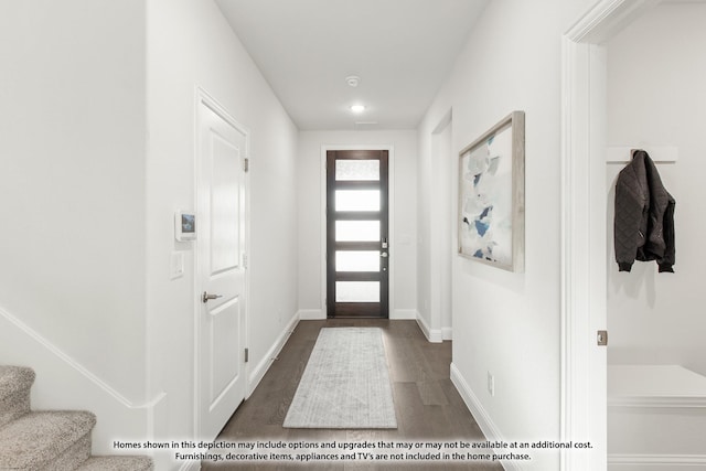 entryway with dark wood-type flooring