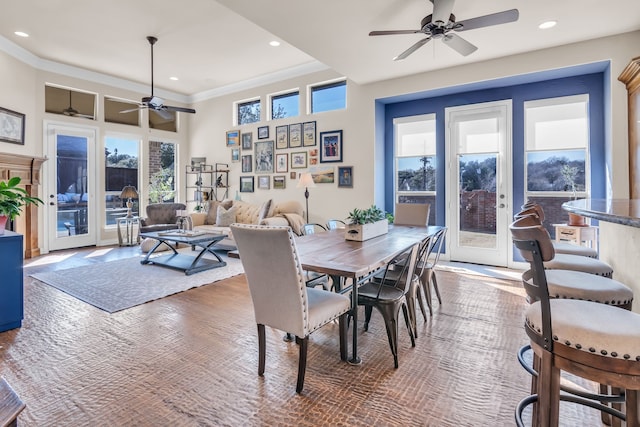 dining area with french doors and crown molding