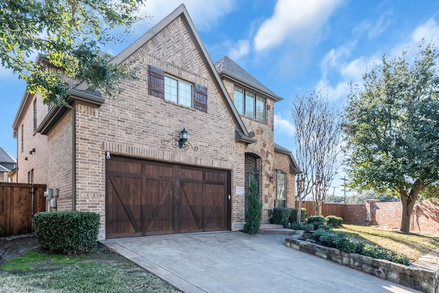 view of side of home featuring a garage