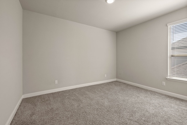 1504 Longspur Dr, Argyle, TX 76226 - carpeted empty room featuring baseboards