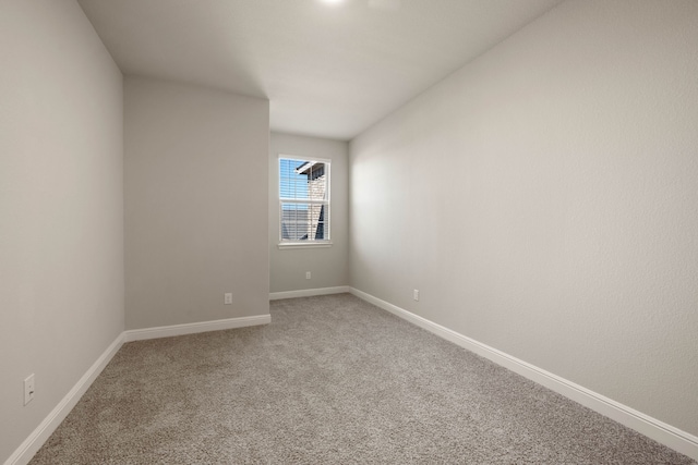 1504 Longspur Dr, Argyle, TX 76226 - spare room with light colored carpet and baseboards