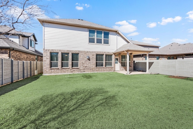 1504 Longspur Dr, Argyle, TX 76226 - rear view of house featuring a patio area and brick siding