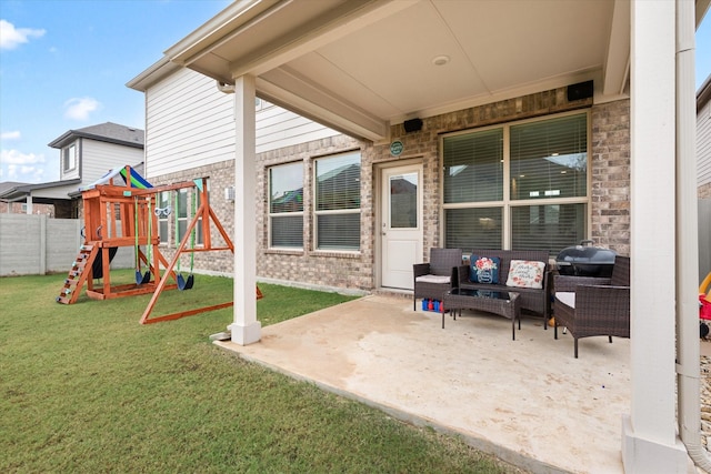 view of patio / terrace featuring outdoor lounge area and a playground