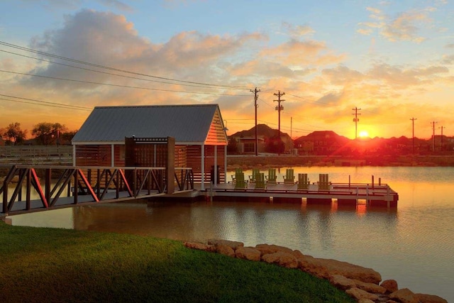 dock area with a water view