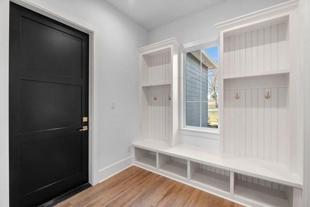 mudroom with hardwood / wood-style flooring