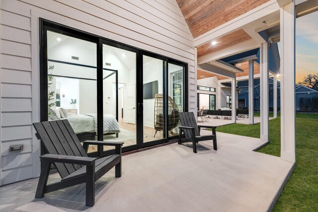 doorway to outside with vaulted ceiling and wooden ceiling