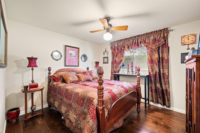 bedroom with dark hardwood / wood-style floors and ceiling fan