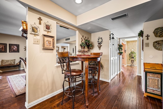 dining room featuring hardwood / wood-style flooring