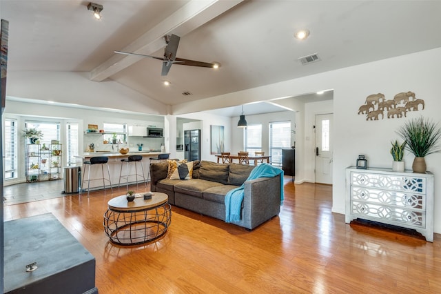 2504 Kingsridge Dr, Dallas, TX 75287 - living room featuring light wood finished floors, a ceiling fan, healthy amount of natural light, and recessed lighting