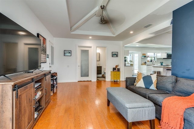 2504 Kingsridge Dr, Dallas, TX 75287 - living room featuring light wood-style floors, recessed lighting, beamed ceiling, ceiling fan, and baseboards