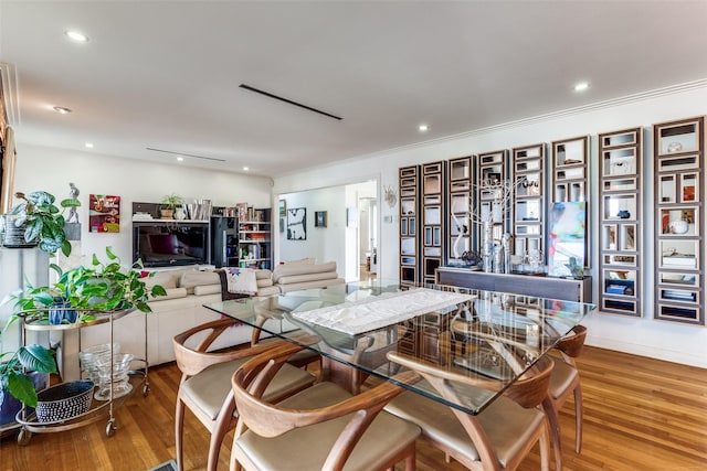 dining area featuring wood-type flooring