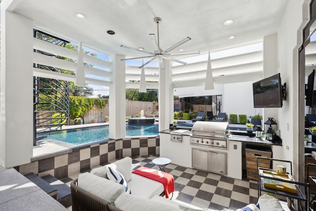 view of patio / terrace featuring a fenced in pool, area for grilling, grilling area, and ceiling fan