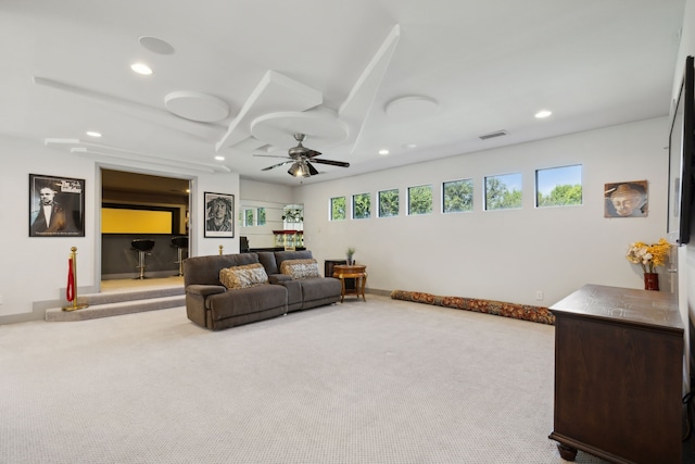 living room with ceiling fan and light carpet