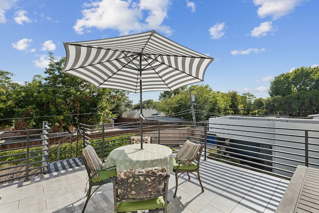 view of patio with a balcony