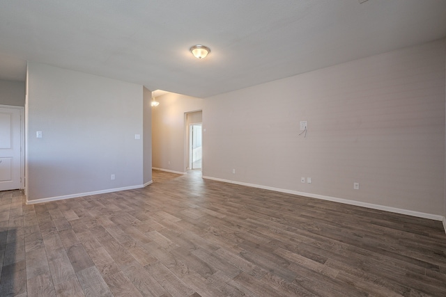 empty room featuring hardwood / wood-style floors