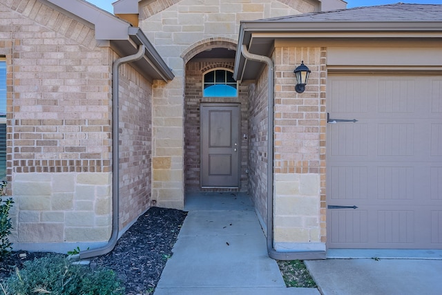 entrance to property with a garage