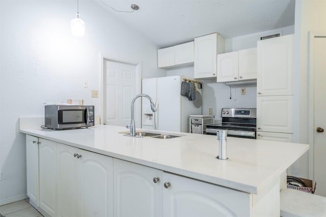 kitchen with light tile patterned floors, white cabinets, sink, pendant lighting, and stainless steel appliances