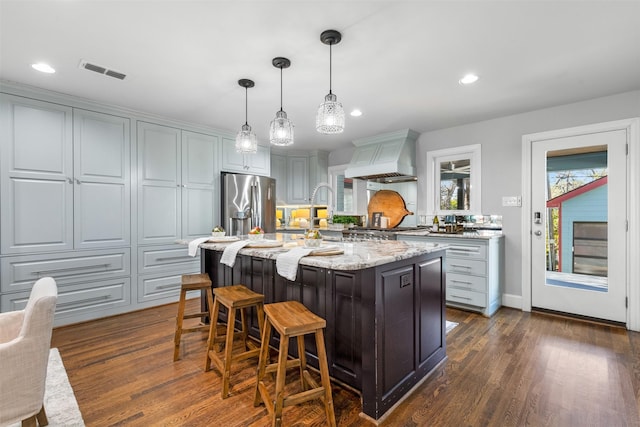 dining area featuring dark wood-type flooring