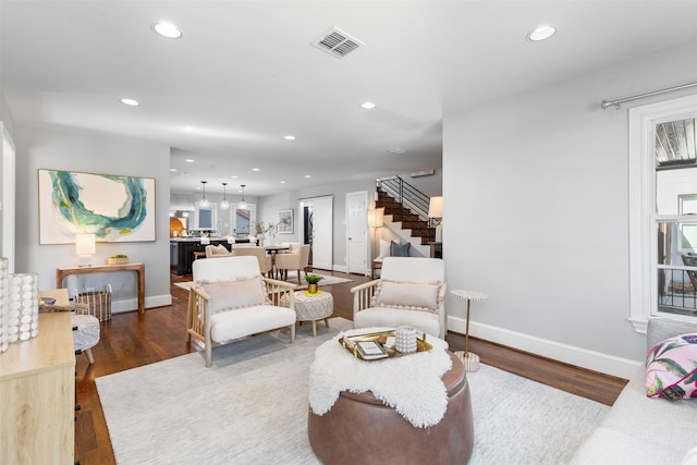 2548 Walsh Ct, Fort Worth, TX 76109 - living room featuring stairway, recessed lighting, wood finished floors, and baseboards
