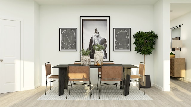 dining area featuring light hardwood / wood-style floors