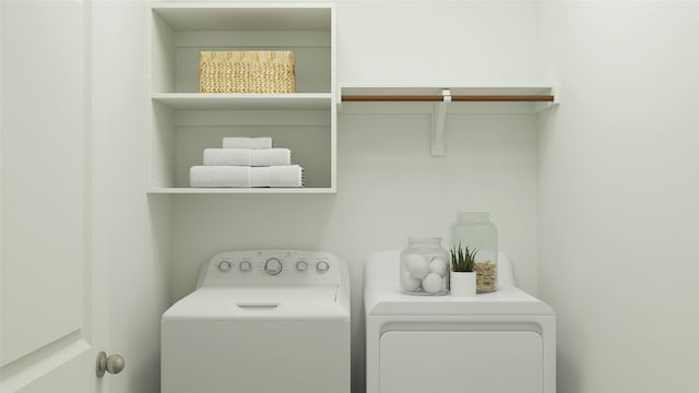 clothes washing area featuring washing machine and clothes dryer