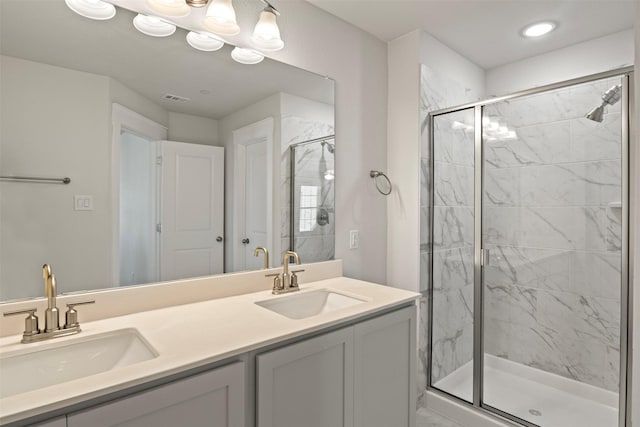 bathroom featuring vanity and walk in shower