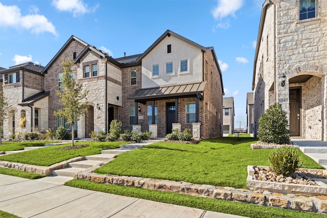 view of front of home featuring a front yard