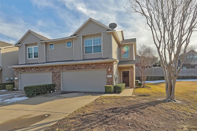 multi unit property featuring a garage