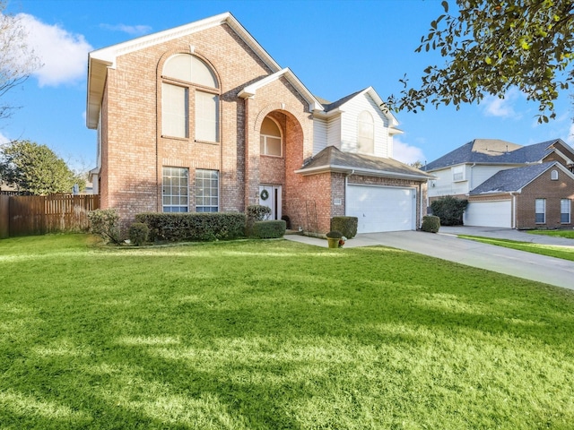 view of front of home featuring a front yard and a garage