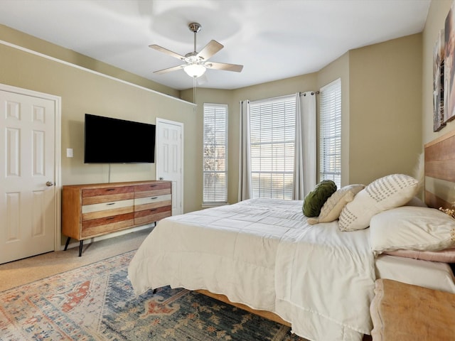 bedroom with carpet flooring and ceiling fan