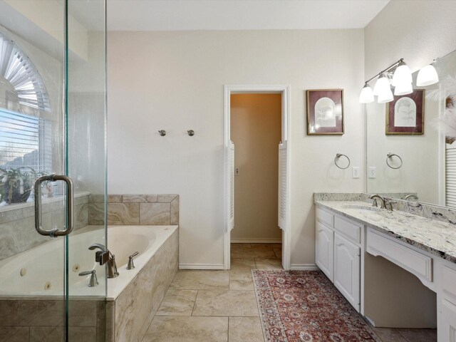 bathroom featuring vanity and an enclosed shower