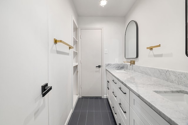 bathroom featuring tile patterned floors and vanity